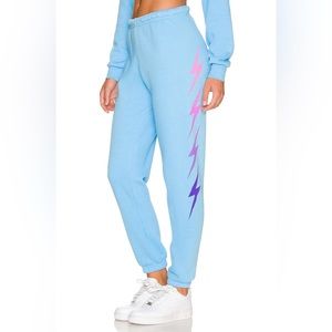 Blue Aviator Nation sweatpants with lightning bolts size small
